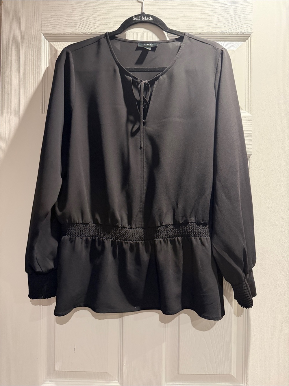 Aldani Black Long-Sleeve Peplum Blouse with Tie Neck